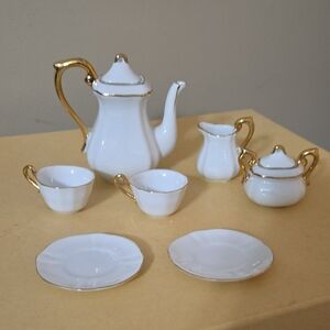 Child's White and Gold China Tea Set for Two